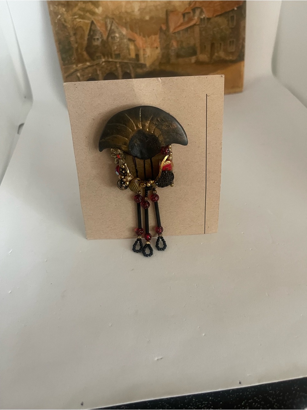 “Mardi gras Gail Jones signed 1990 Gold & Black Beaded Brooch with Red Accents